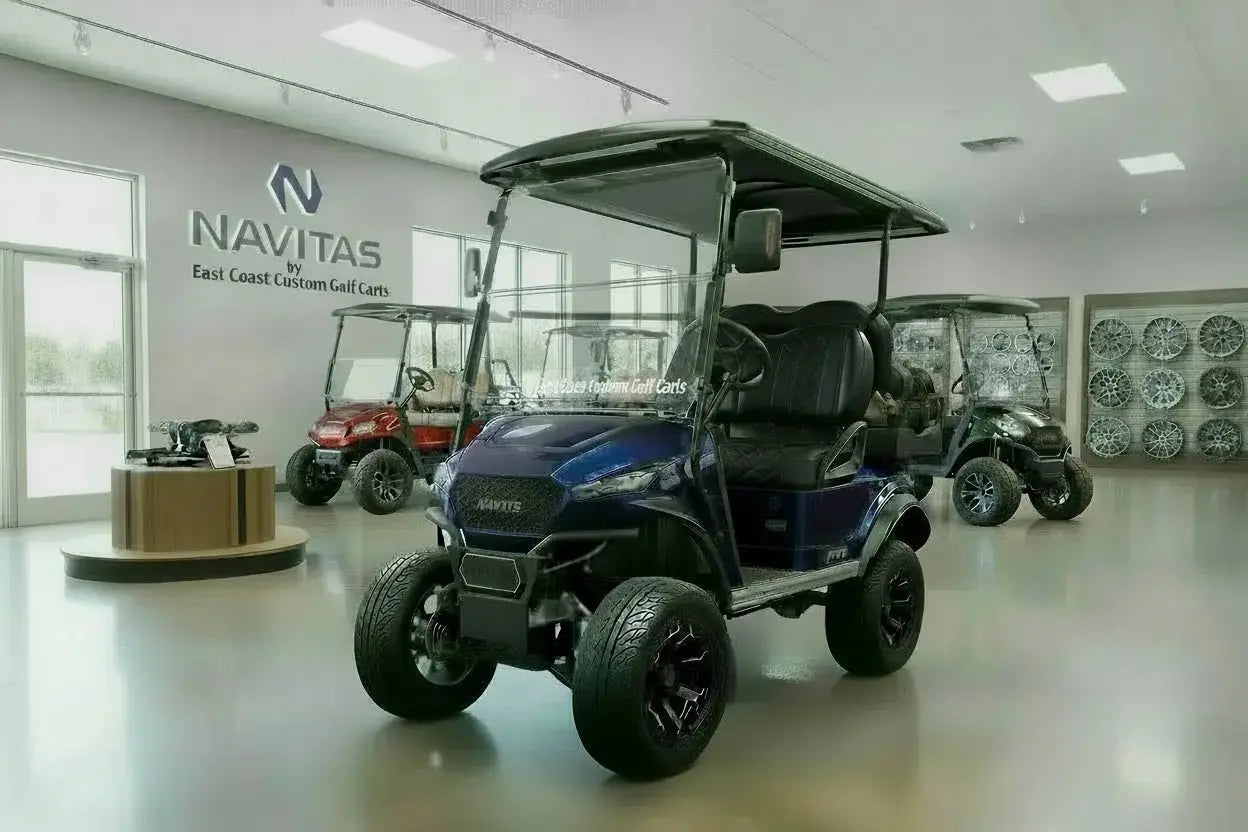 Navitas Lifted Aluminum Chassis Admiral Black with grey seats,  driver front angle view in EC showroom.