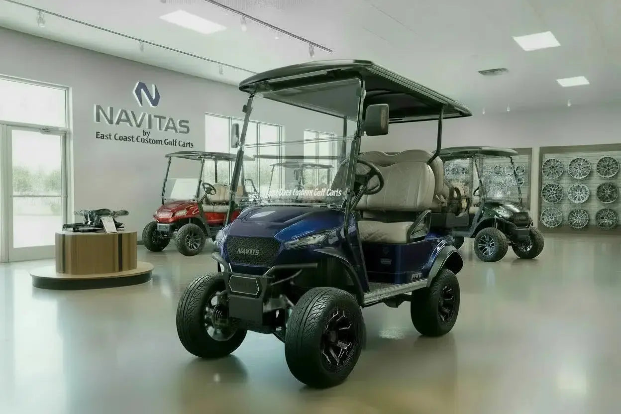 Navitas Lifted Aluminum Chassis Admiral Blue with grey seats,  driver front angle view in EC showroom.
