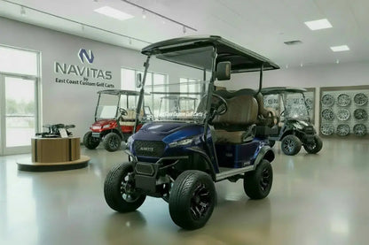 Navitas Lifted Aluminum Chassis Admiral Blue with mocha brown seats,  driver front angle view in EC showroom.
