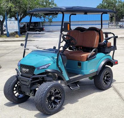 Navitas Lifted Aluminum Chassis Seat Storm with rust seats,  driver front angle view in EC lot.-2
