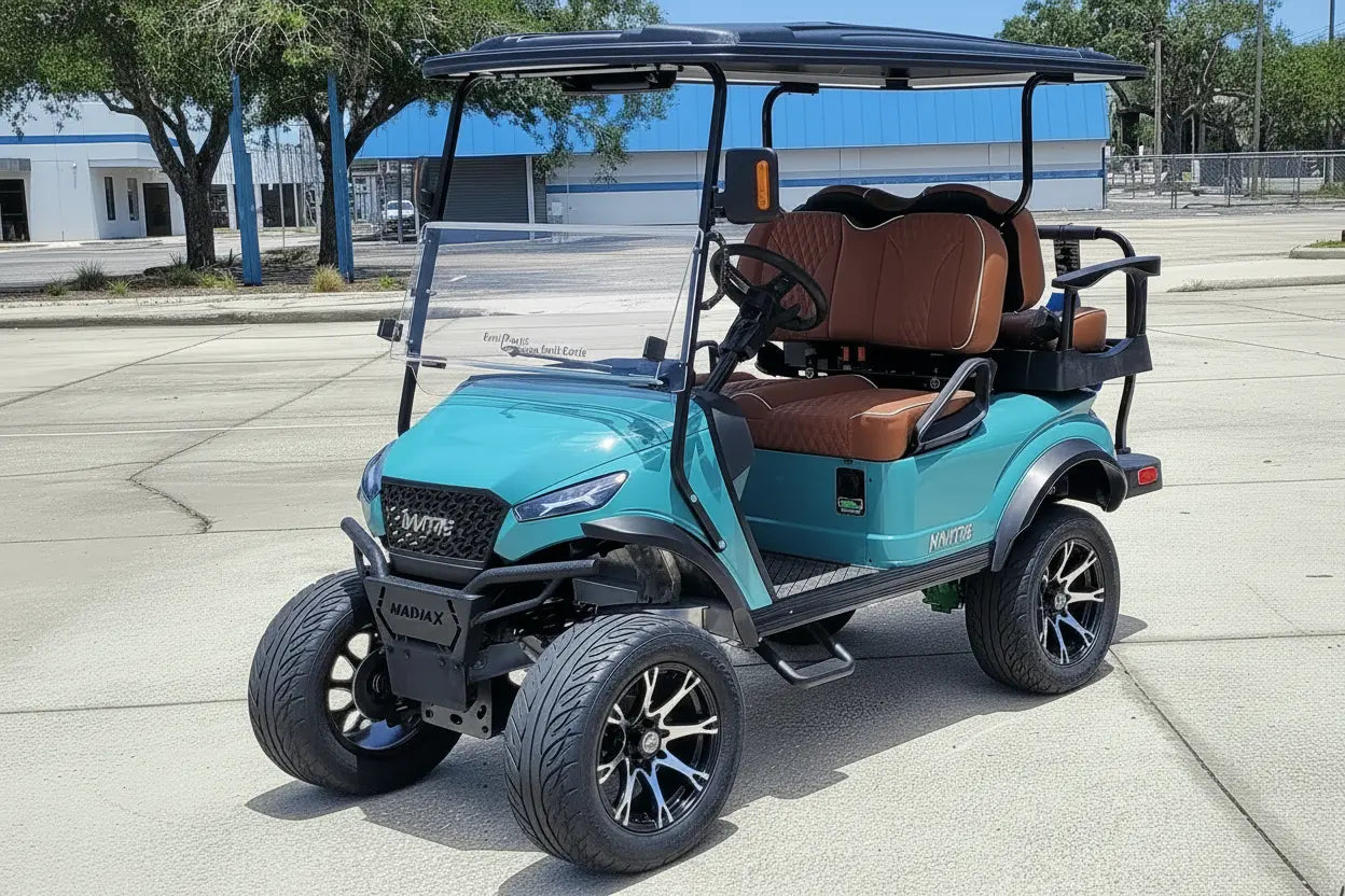 Navitas chassis with a sea storm body rust colored seats driver front view in front parking lot