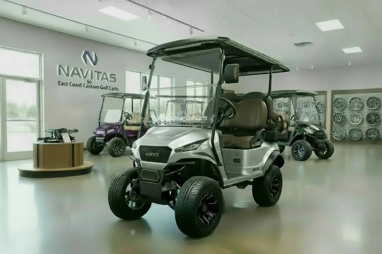 Navitas Lifted Aluminum Chassis Silver Metallic with mocha brown seats,  driver front angle view in EC showroom