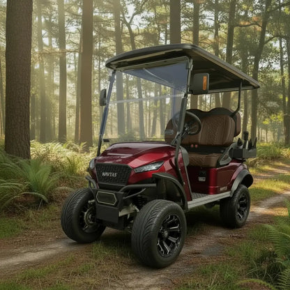 Navitas Lifted Aluminum Chassis Cherry Metallic with brown seats,  driver front angle view on a trail