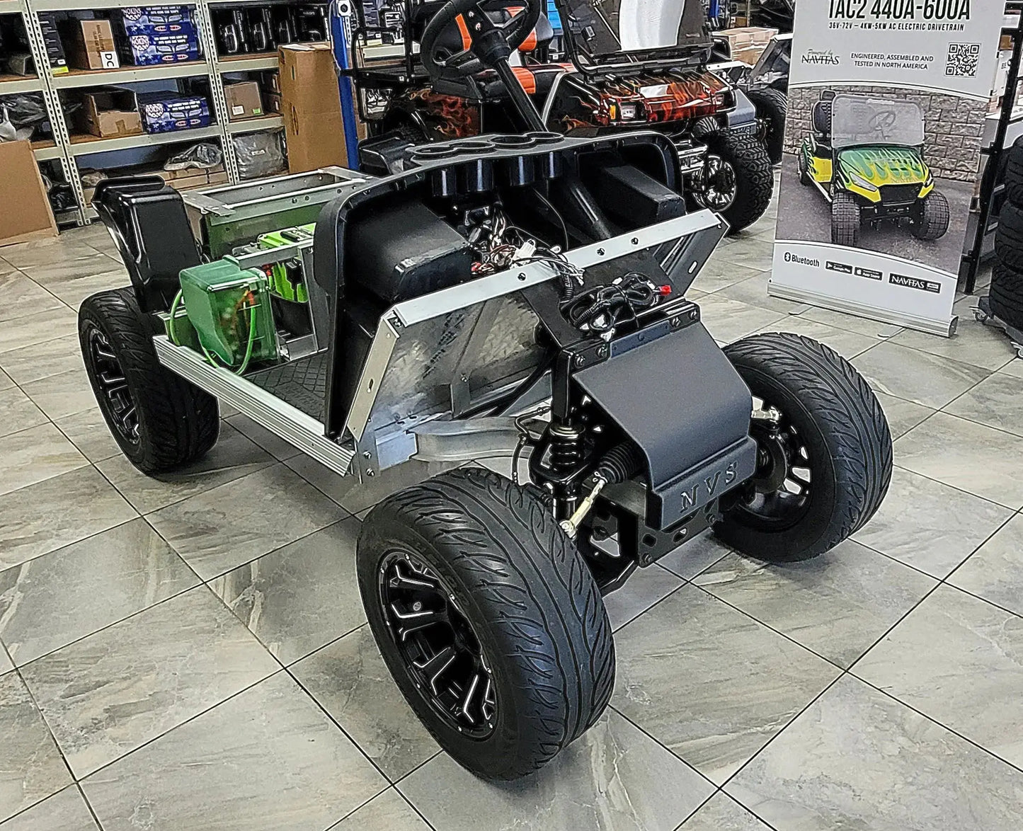Navitas Chassis on wheels passenger front in showroom