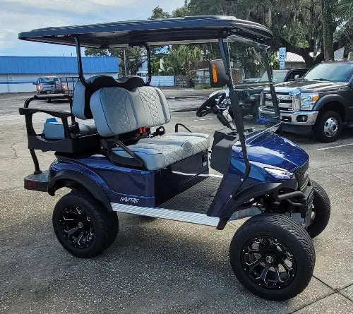 Navitas Lifted Aluminum Chassis Admiral Blue with grey seats passenger side view