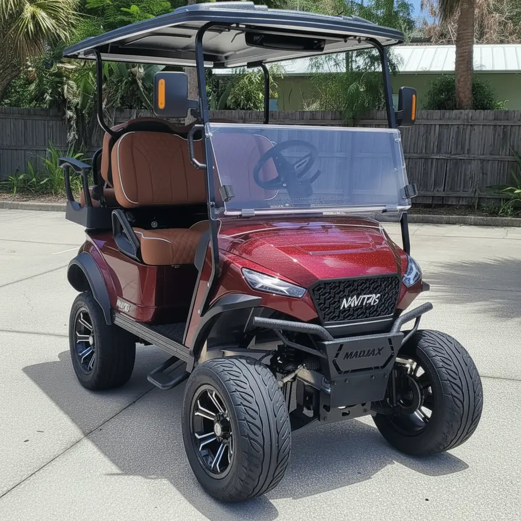 Navitas chassis cherry metallic with rust brown seats passenger front angle View at shop