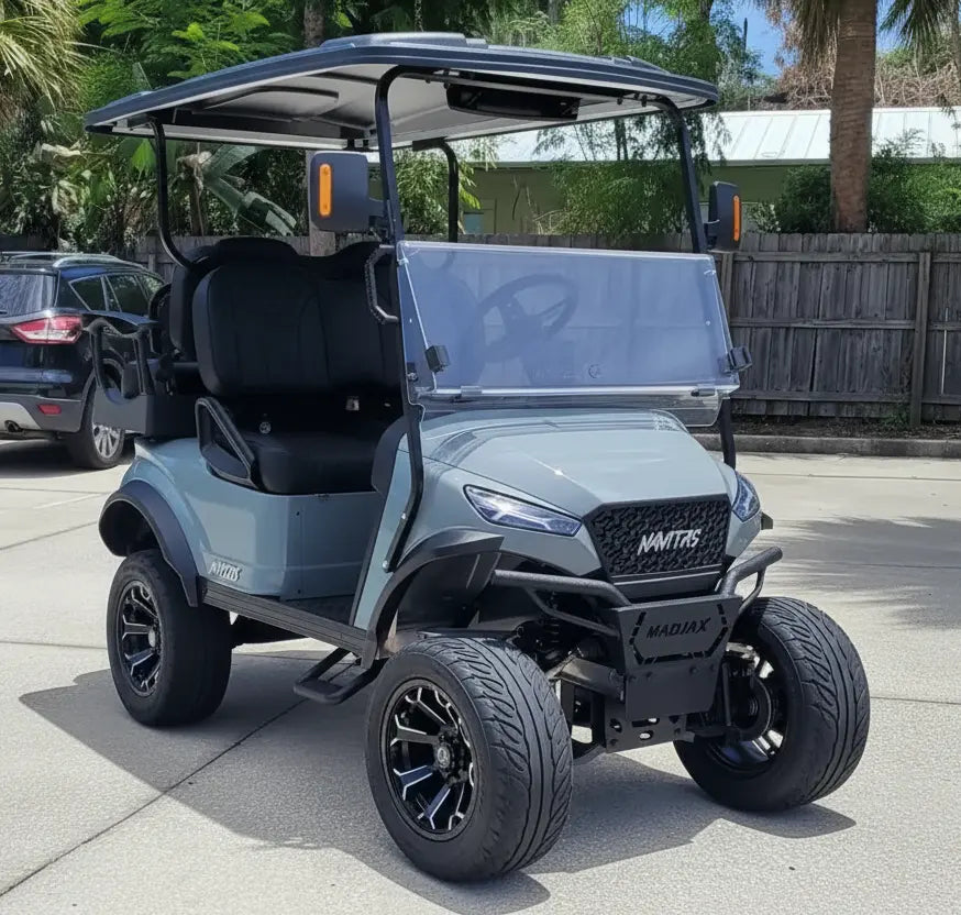 Navitas chassis cement gray with black seats passenger front angle View at shop
