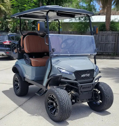 Navitas chassis cement gray with rust brown seats passenger front angle View at shop