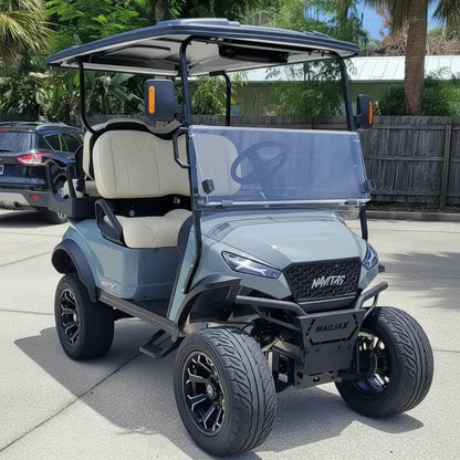 Navitas chassis cement gray with white seats passenger front angle View at shop