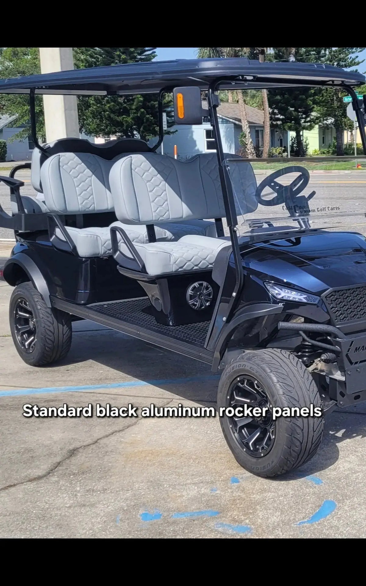 Jaguar Dark Sapphire Navitas 6 passenger aluminum chassis with standard black aluminum rocker panels