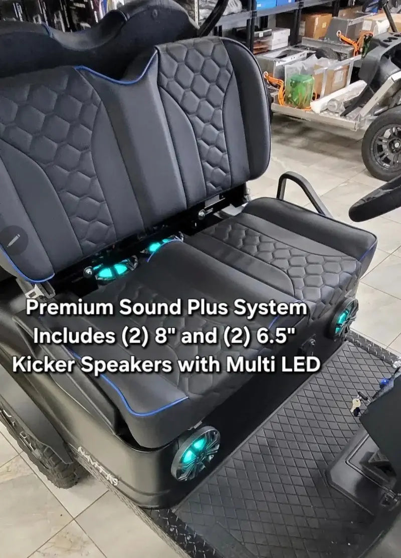 Matte Black Navitas chassis with premium black seats. Cart has (2) 8" and (2) 6.5" kicker speakers with multi LED lighting and controls.